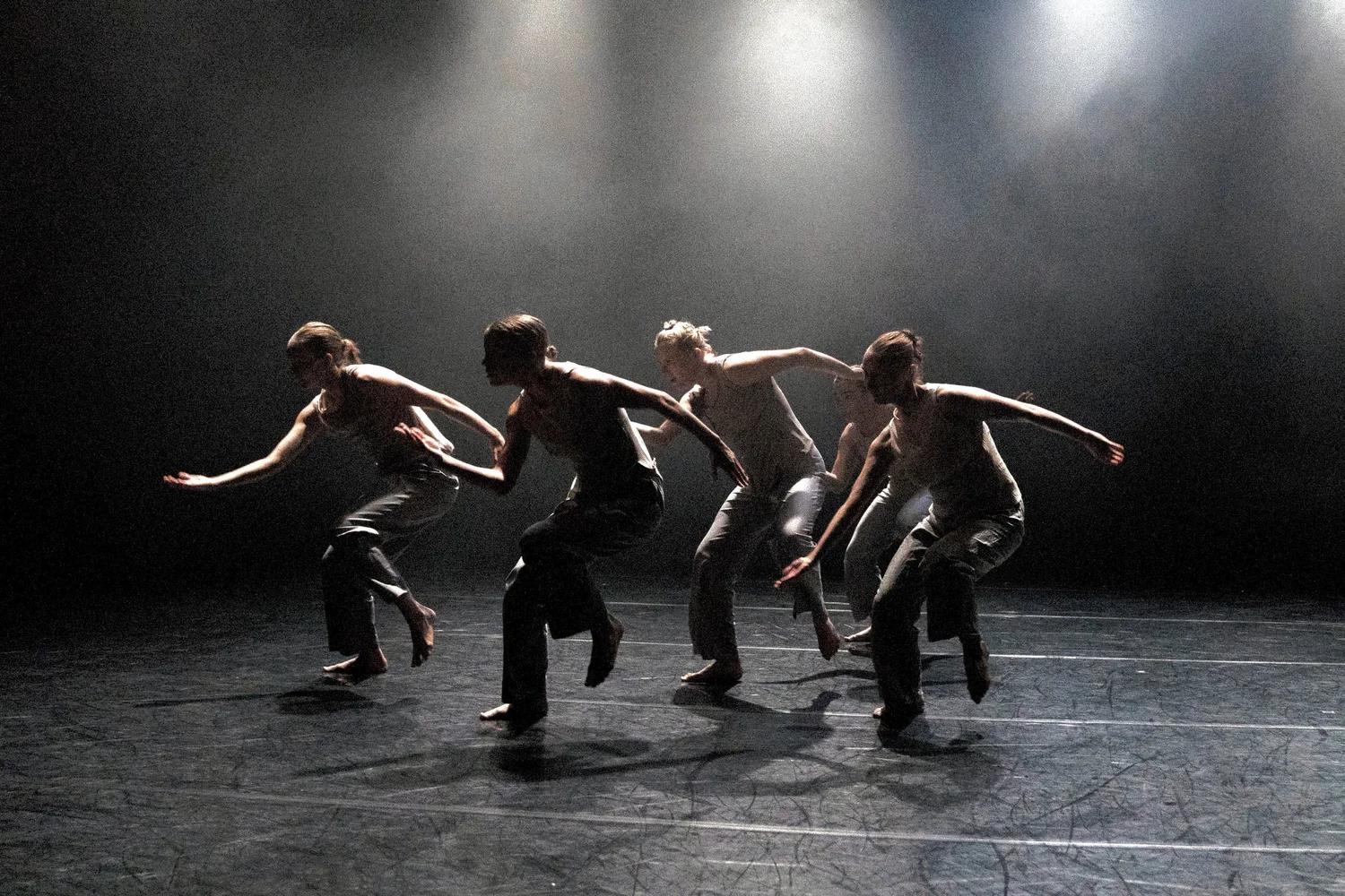 Five dancers in white