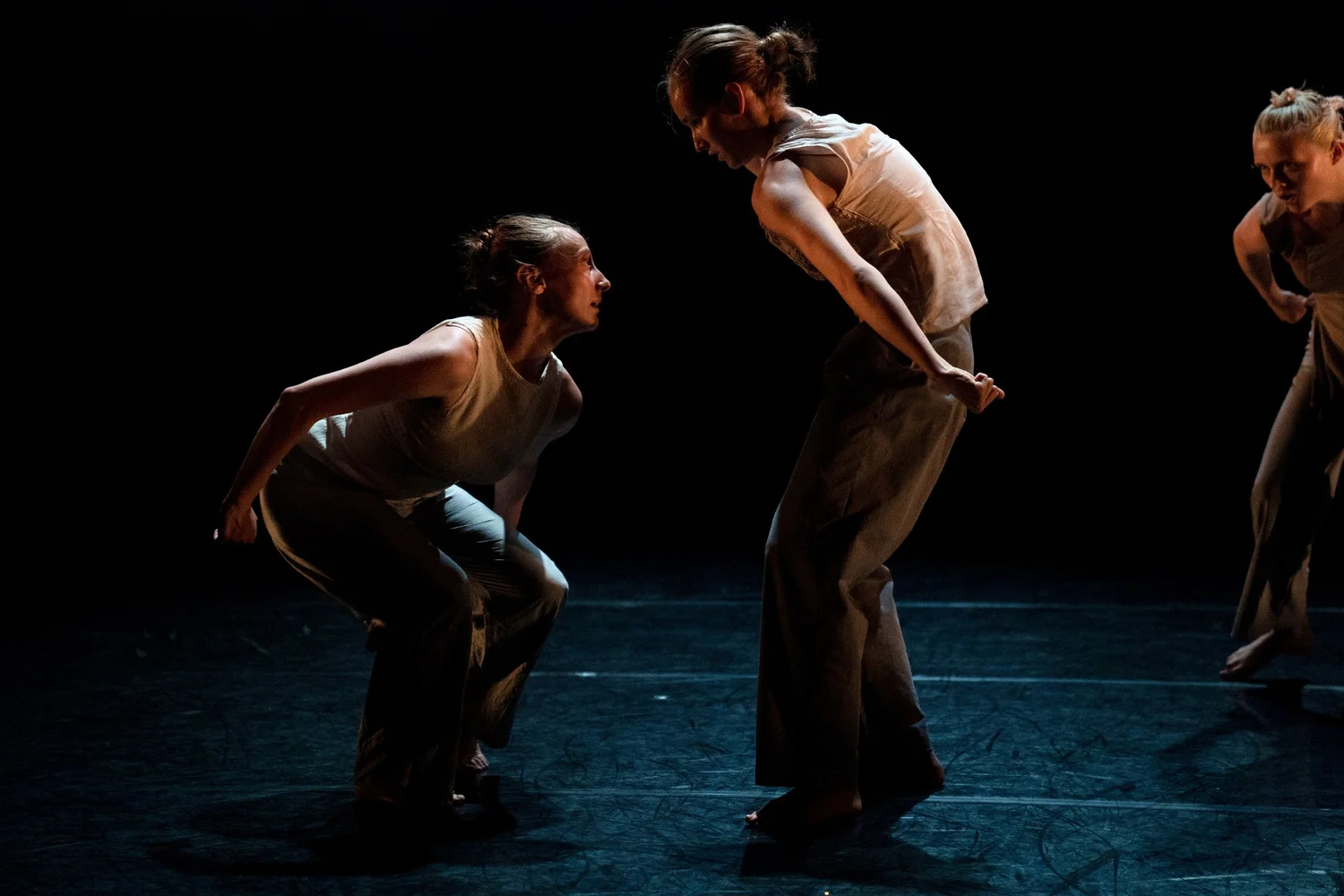 Three dancers on stage